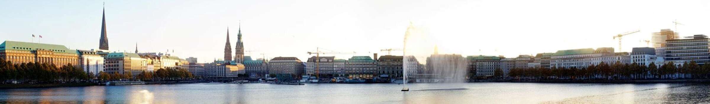 Hamburg's Binnenalster with the Alster fountain and the town hall tower behind